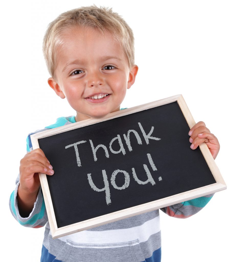 Child with Thank You Sign